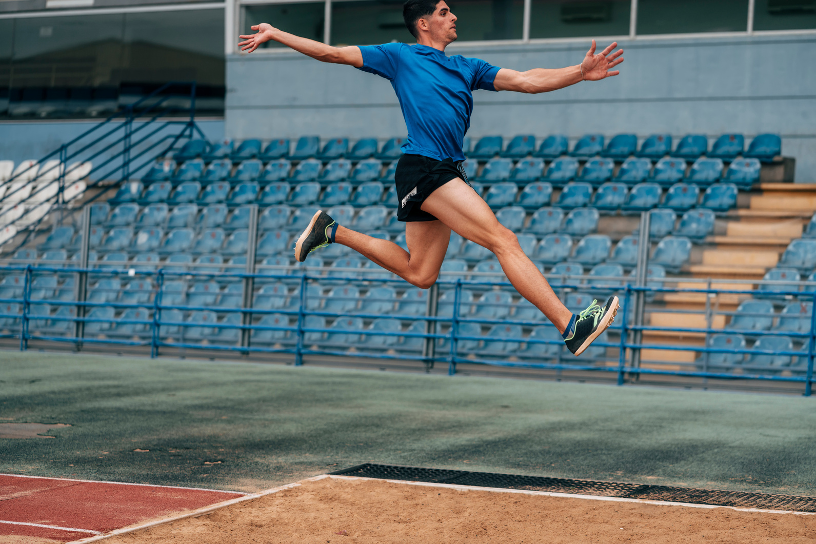 Long jump, Professional Male Athlete Jumping on Long Distance